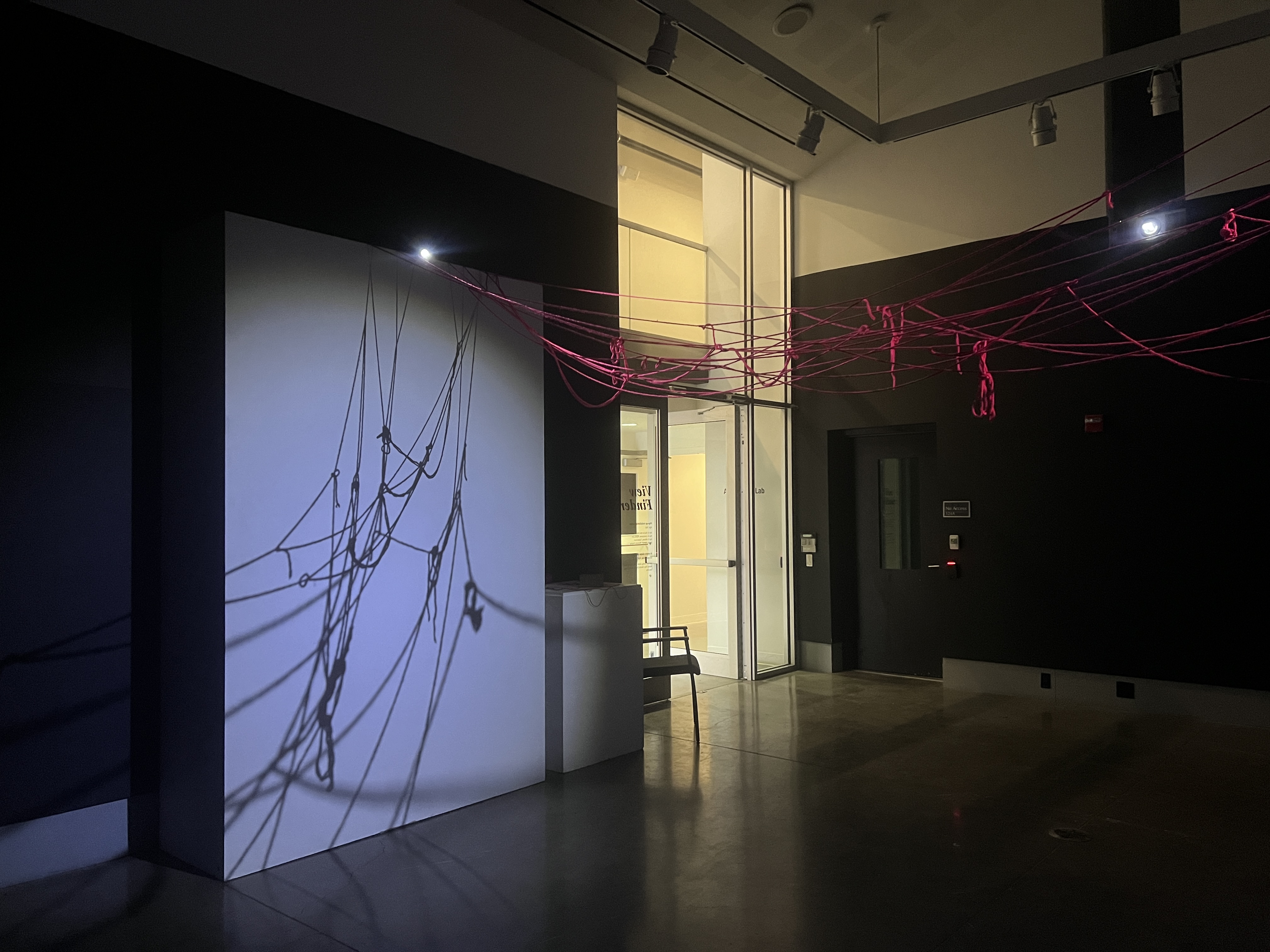 Exhibition entry angle with rope shadows
